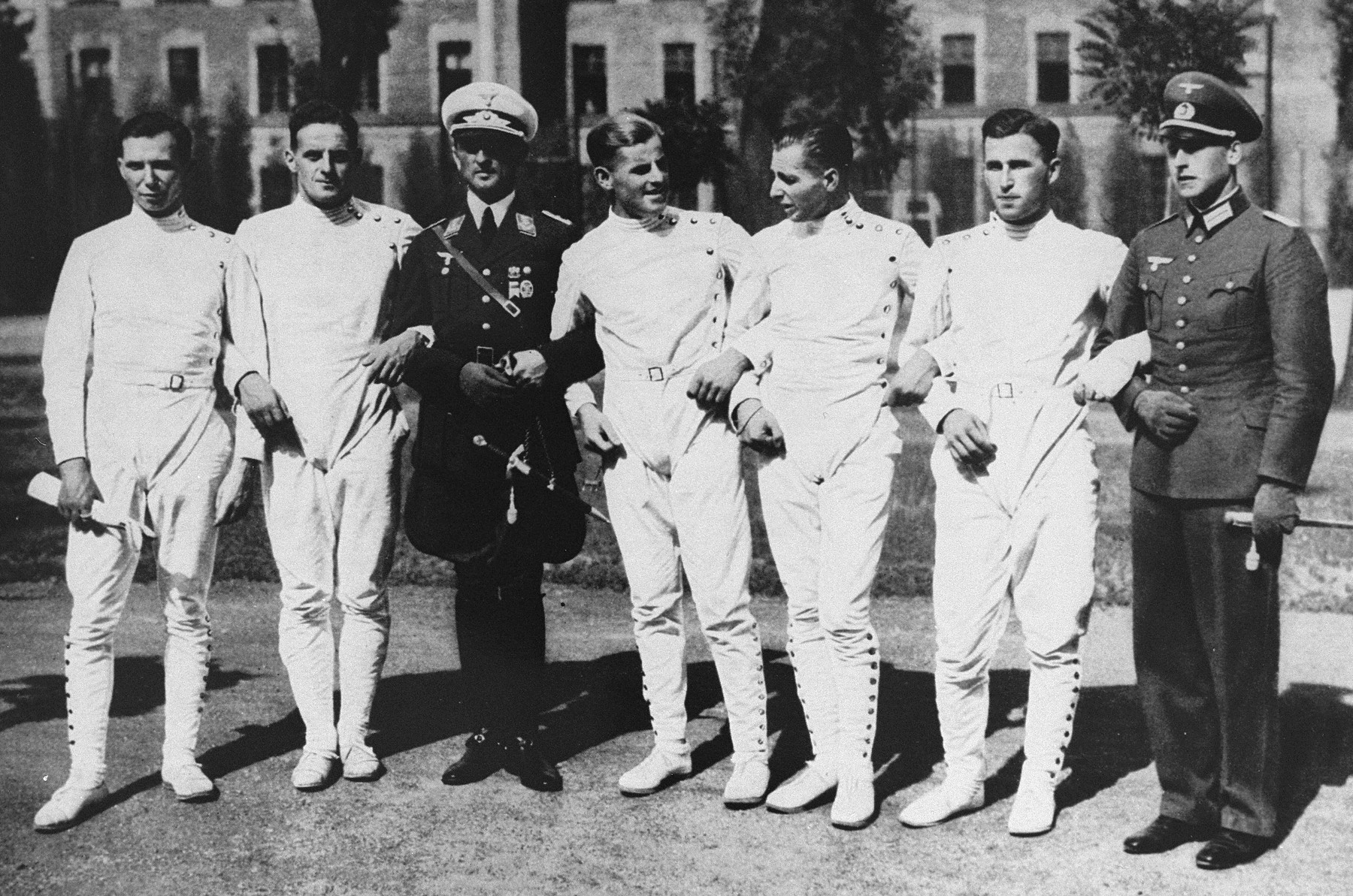 Group portrait of the members of the German Pentathalon team after their victory in Budapest.  This victory qualified the team to compete at the 1936 Berlin Olympics.

Pictured here, from left to right, are Oberlt. Birk, Oberlt. Handrick, Hauptmn. Heigl, Lt. Puttmann, Lt. Lemp, and Lt. Schreiber.