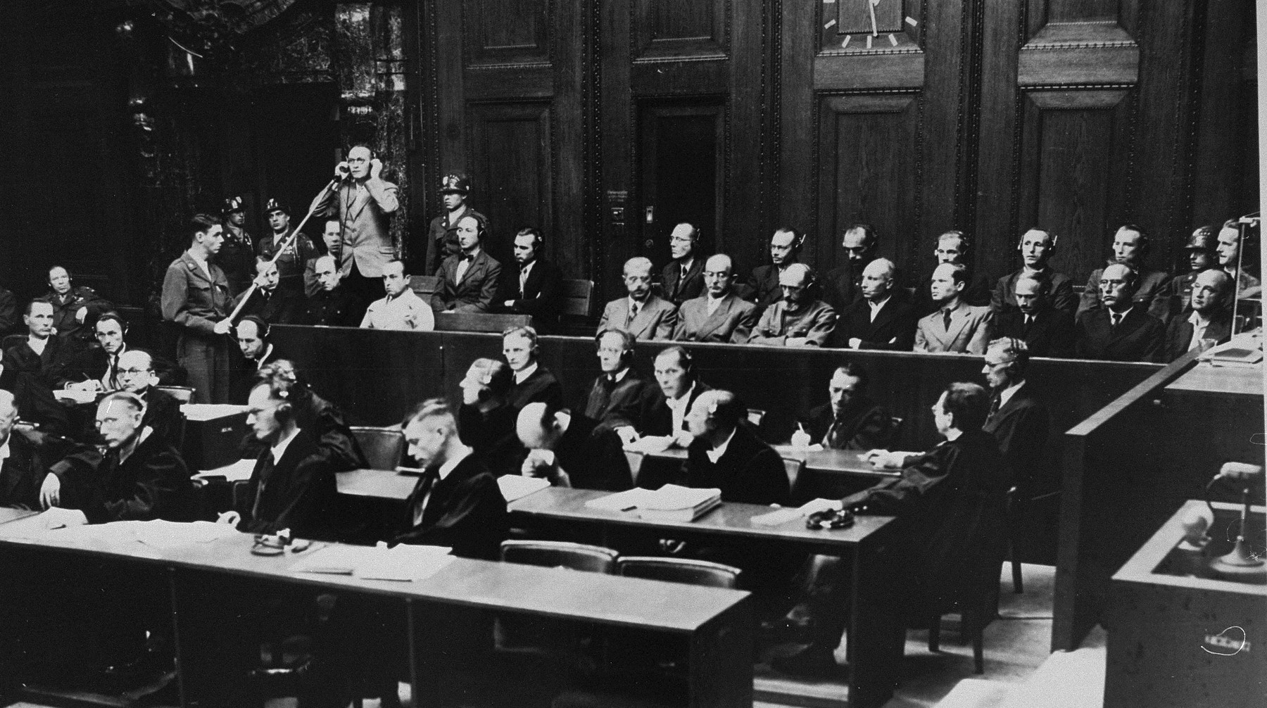 Defendant Walter Haensch pleads not guilty during his arraignment at the Einsatzgruppen Trial.