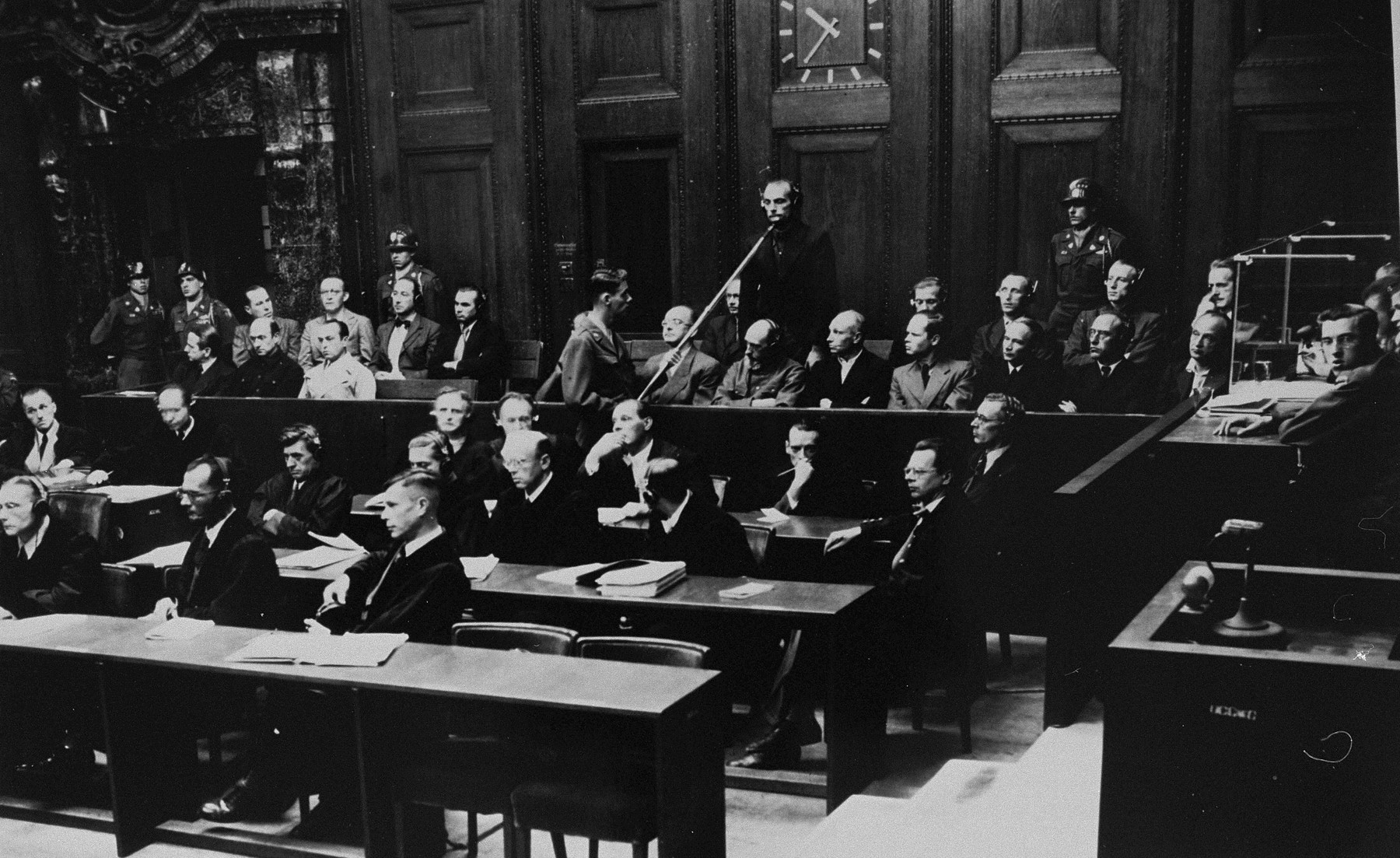 Defendant Lothar Fendler pleads not guilty during his arraignment at the Einsatzgruppen Trial.