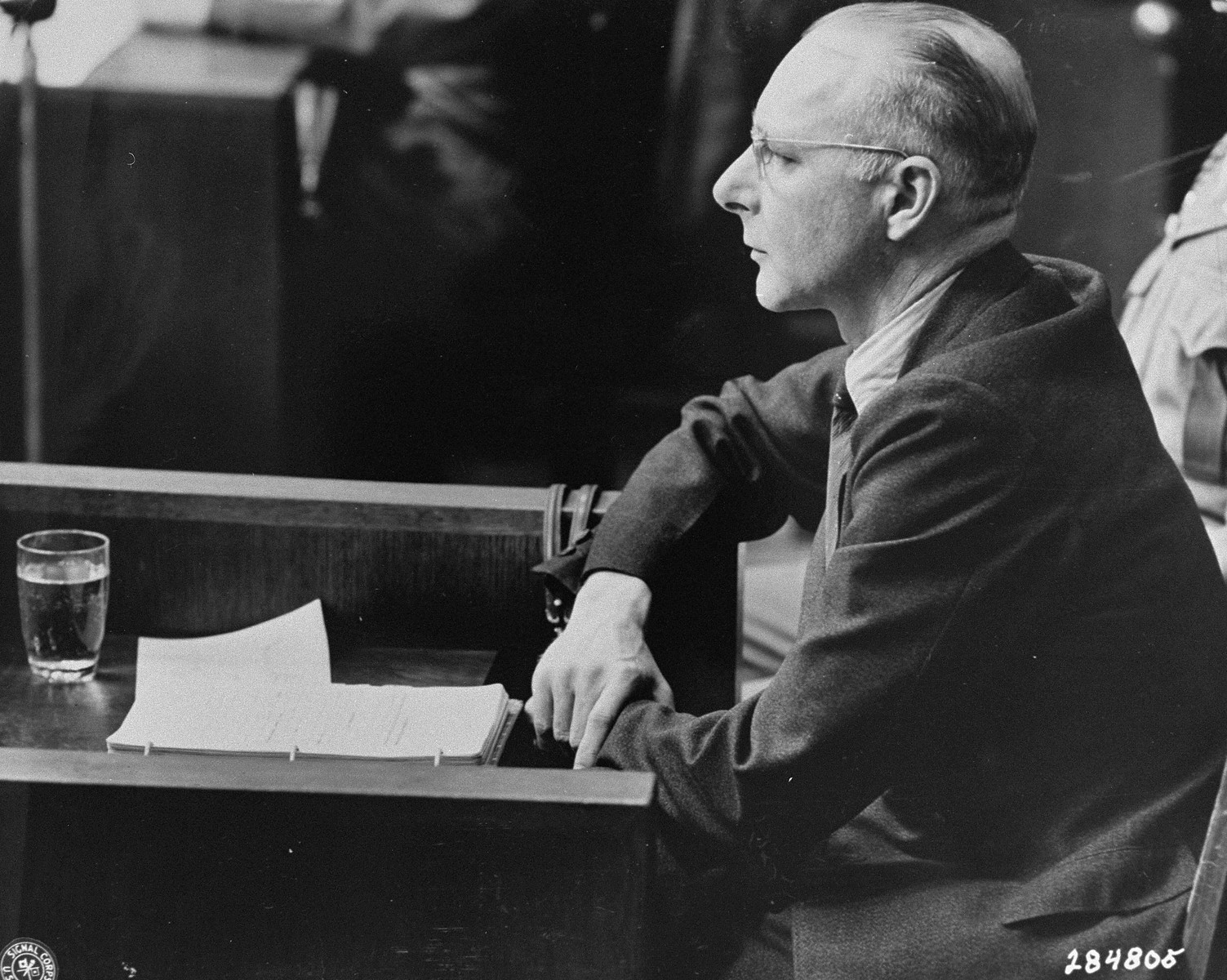 Victor Brack on the first day of his testimony in his own defense during the Doctors Trial.  

Brack served as the Chief Administrative Officer of the Chancellery during the war.