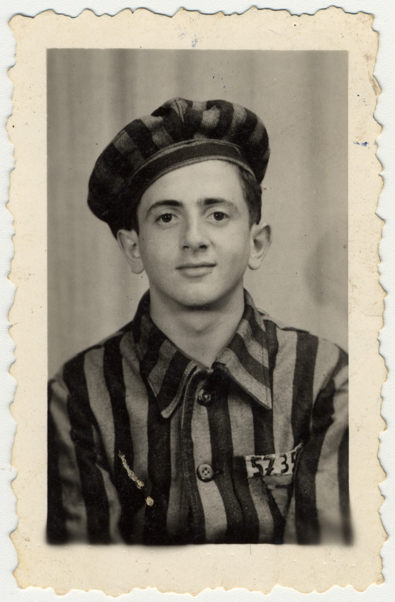 Studio portrait of Buchenwald survivor, Benek Wrzonski, wearing a prisoner uniform.  The children went to to a photo studio in town asking for a portrait of themselves in uniform.