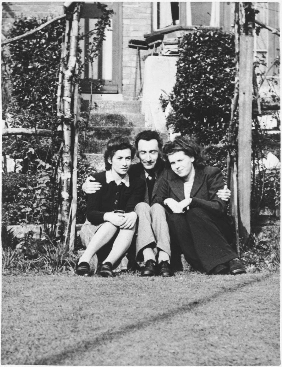 Ruth Cohn and her future husband, Karl Terner, sit with another young women on the steps of a boarding house in Birmingham, England.