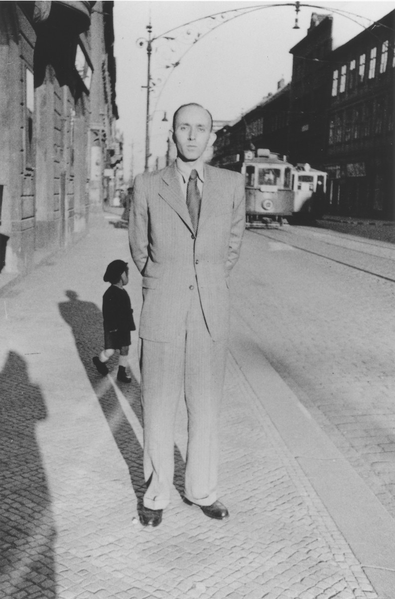 Norbert Hermann, the son of a Catholic mother and a baptized Jewish father, poses on a street in Prague during the German occupation. 

Norbert Hermann served in the German army from 1939 to 1940, but was expelled after being classified as a Mischling.  He was not, however, required to wear a Jewish badge.