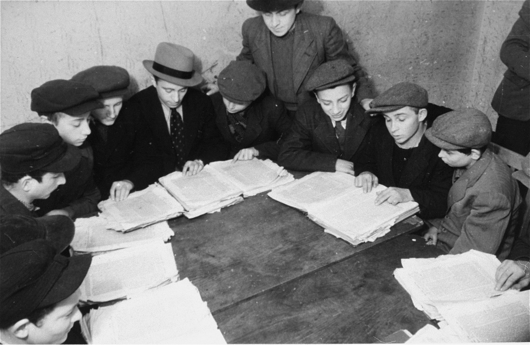 Students study Talmud at a Yeshiva in the Zeilsheim displaced person's camp.