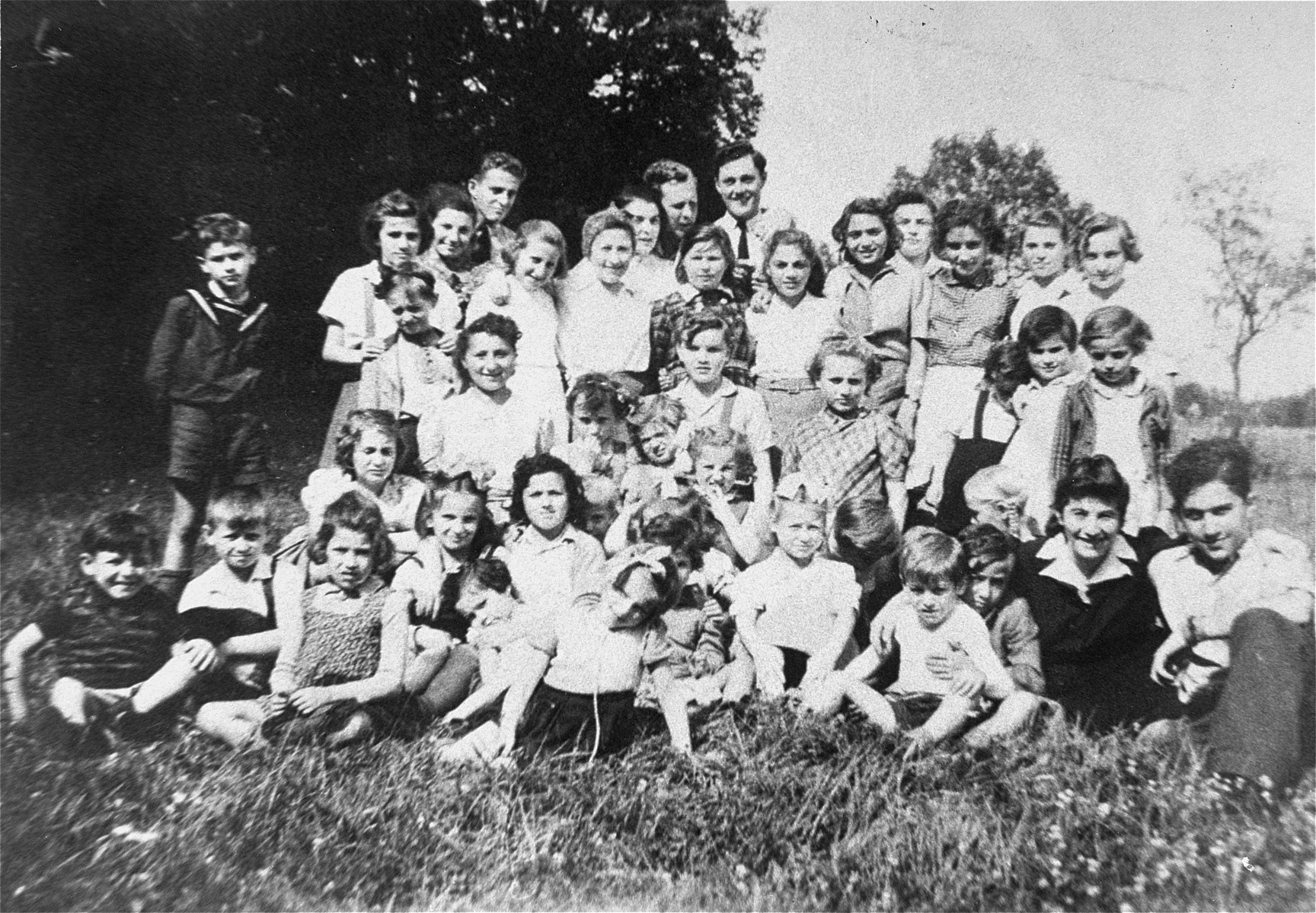 A group photograph of children in the Bergen-Belsen displaced persons' camp in 1946.