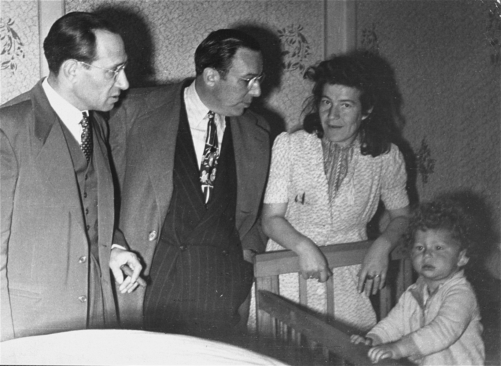 JDC representatives visit child care facilities at the Foehrenwald displaced persons camp.  

Among those pictured is Samuel Haber, Director of JDC programs in the U.S. Zone from 1947 until 1954 (left).