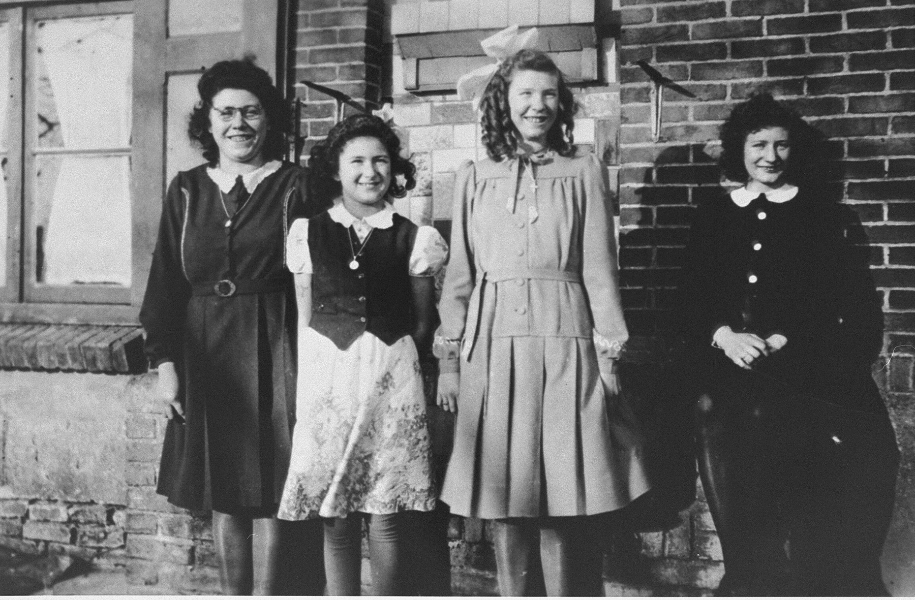 Marion Kaufmann visits the family who hid her during the war. 

She made this last visit before her immigration to the United States. From left to right are: Marie Beelen, Marion Kaufmann (who was hidden under the name Renie Beelen), Rie Beelen, and Grada Beelen.