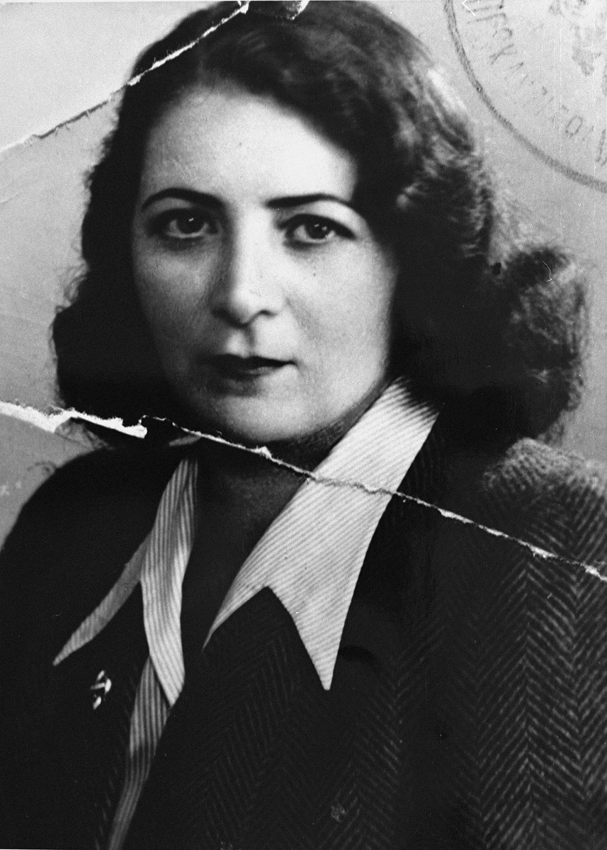 Identification portrait of a Jewish woman, who had survived the war in hiding, just after the liberation.

Pictured is the mother of Romana Schreier.