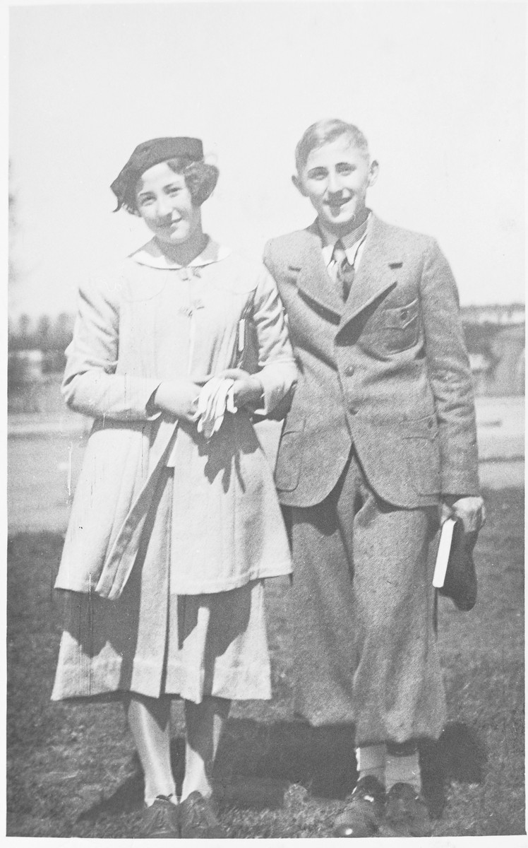 Margot (Miriam) and Gerhard (Gad) Beck pose outside on the day of his Bar Mitzvah.