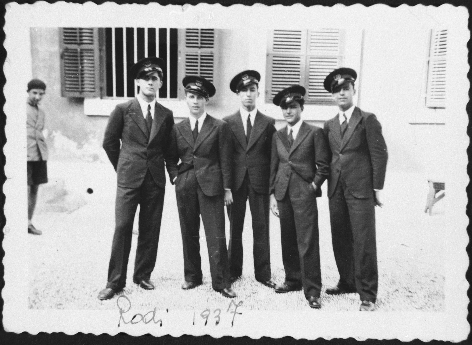 Students at the Rabbinical College in Rhodes in uniform.

Among those pictured is Haim Menasce (center).