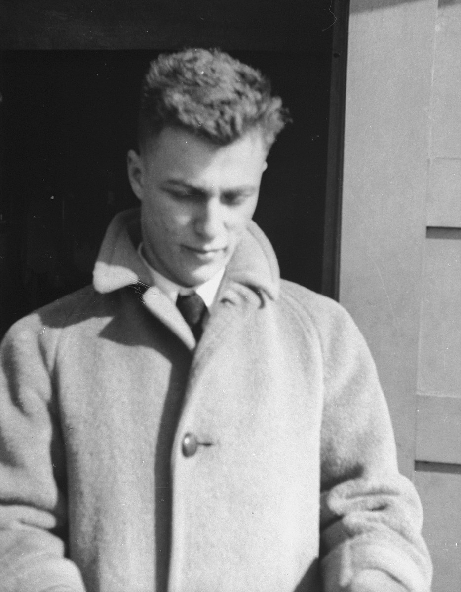 A crew member of the President Warfield (later the Exodus 1947) poses on the deck of the ship before its departure for Europe. 

Pictured is Bentley Forman.