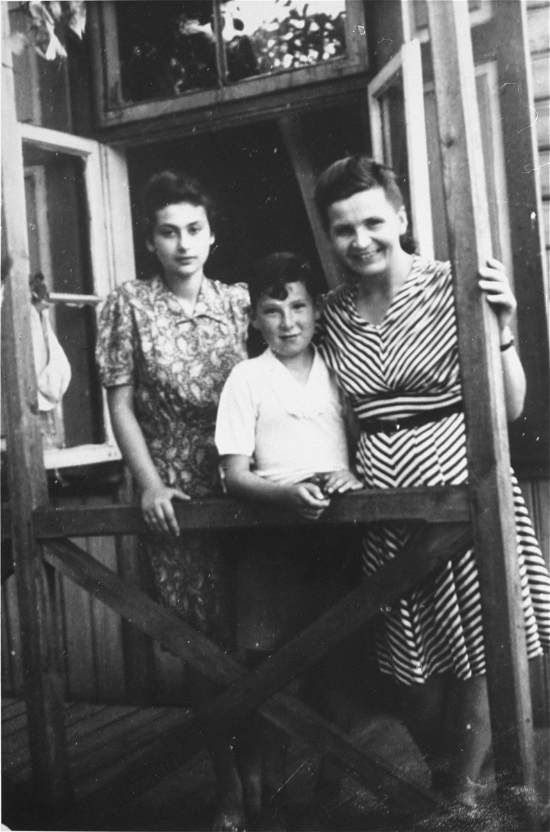 Group portrait of two survivors with thieir rescuer. 

Bianka Rozenman, the donor, (left), her cousin, Gabriel Rozenzwajg (false name - Zakrzewski) and their rescuer, Genowefa Olarak.  Genowefa helped to hide many members of the Rozenman and Rozenzwajg families, but only Bianka and Gabriel survived.  Genowefa was recognized by Yad Vashem as one of the Righteous Among the Nations.