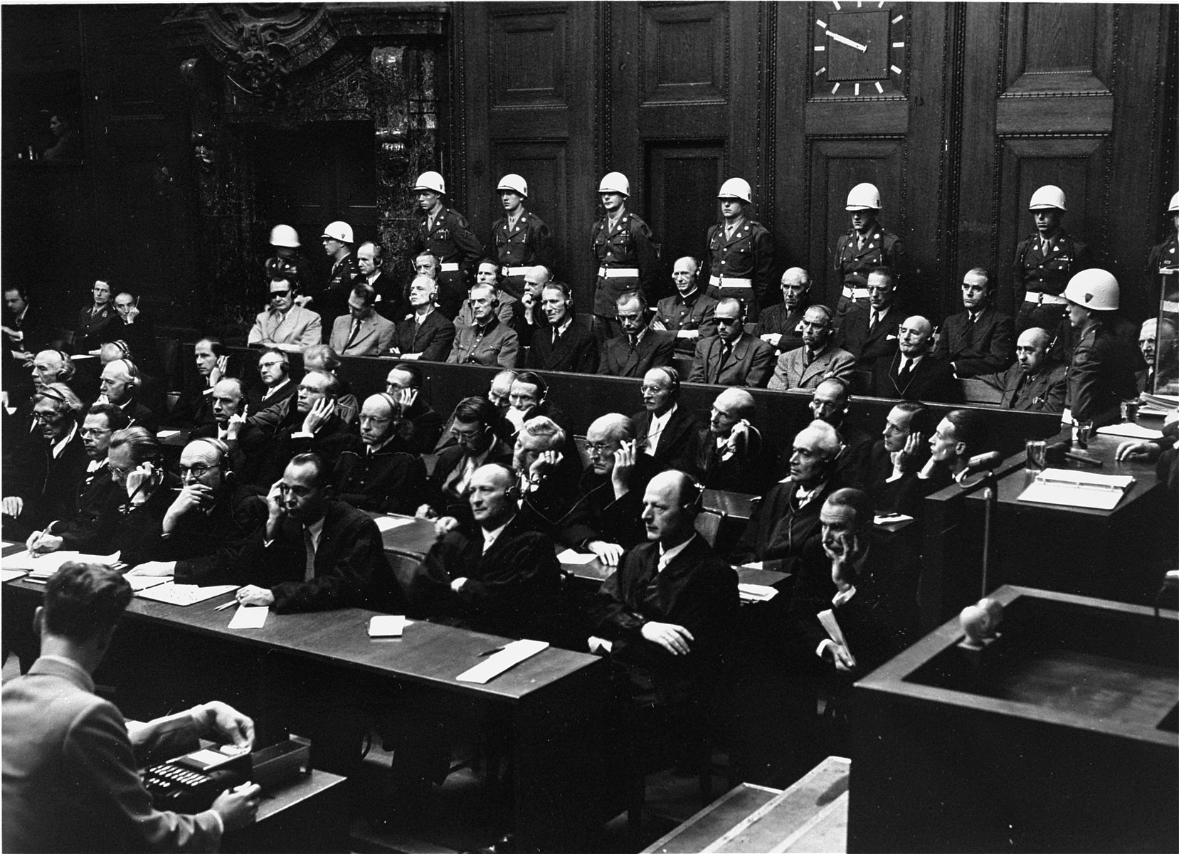 The defendants and their lawyers follow the proceedings at the International Military Tribunal trial of war criminals at Nuremberg.