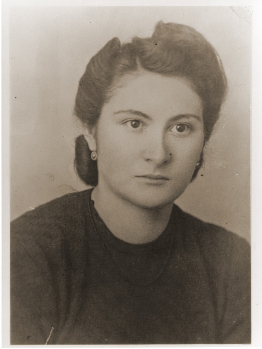 Identity card photo of a young Jewish woman in Bielsko Biala, Poland.  

Pictured is eighteen-year-old Amalie Reichmann.