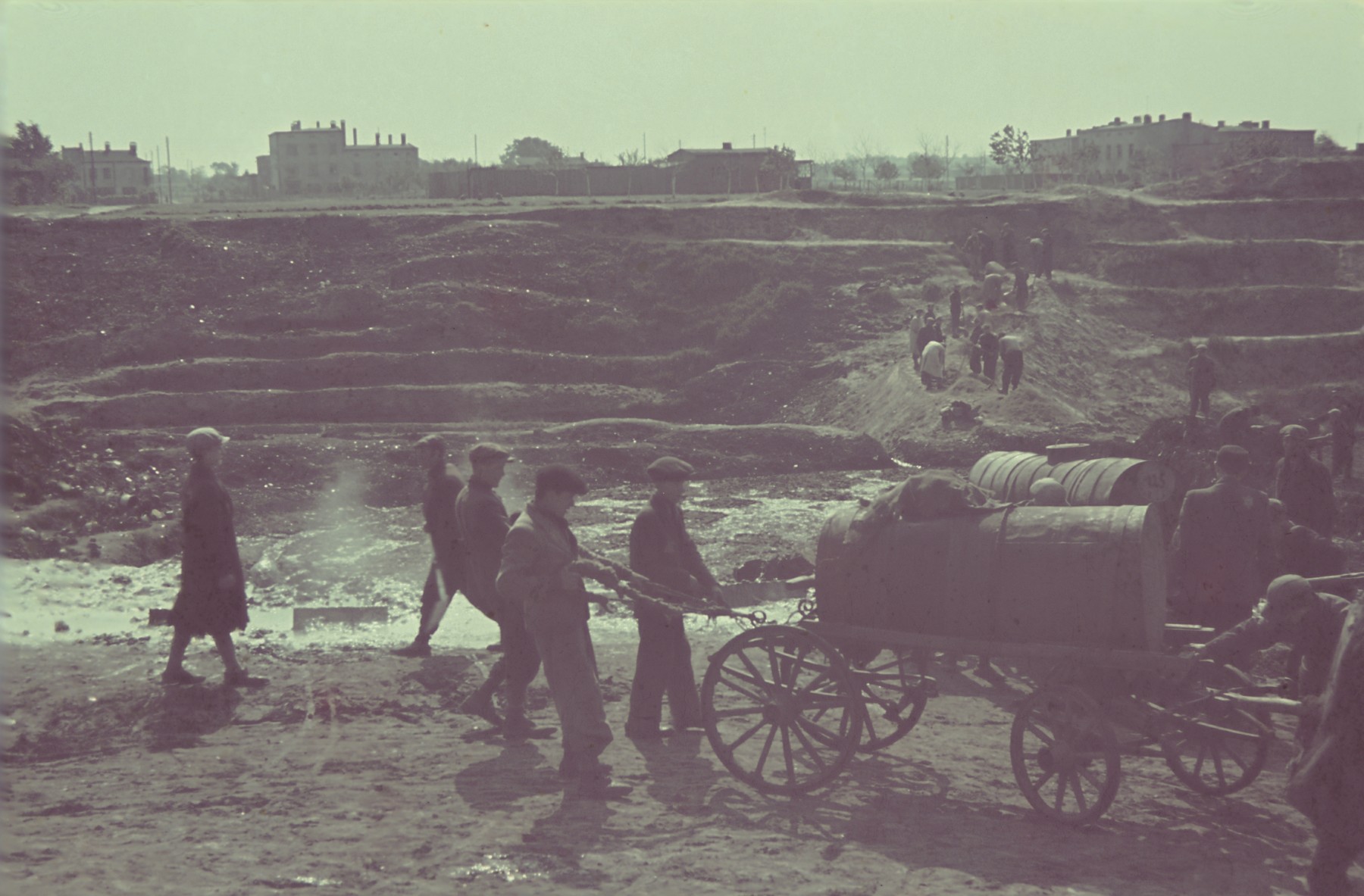 Fecalists dispose of sewage in the Lodz ghetto.