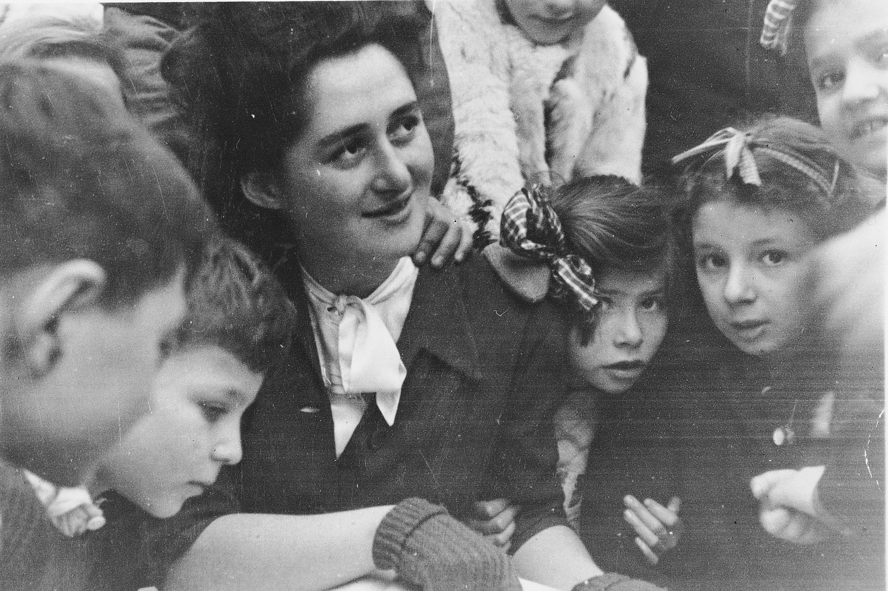 Rita Leisner is surrounded by a group of her students in the Fontenay-aux-Roses children's home.