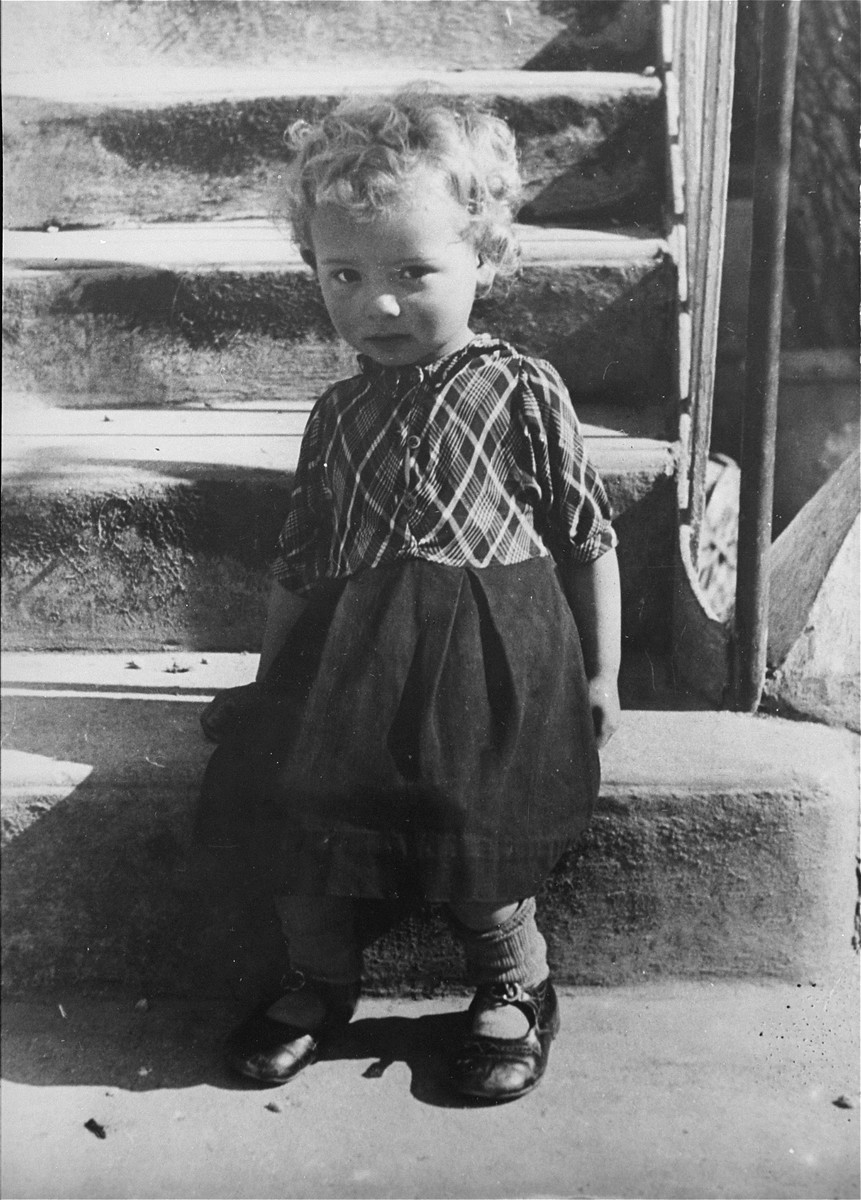 Portrait of a Jewish refugee child at the Hotel Bompard internment camp.

This photo is from a series taken by Julia Pirotte, a native of the region, who was invited by the "camp" commander to photograph the women and children because "[the] Joint [Distribution Committee] was organizing a banquet."