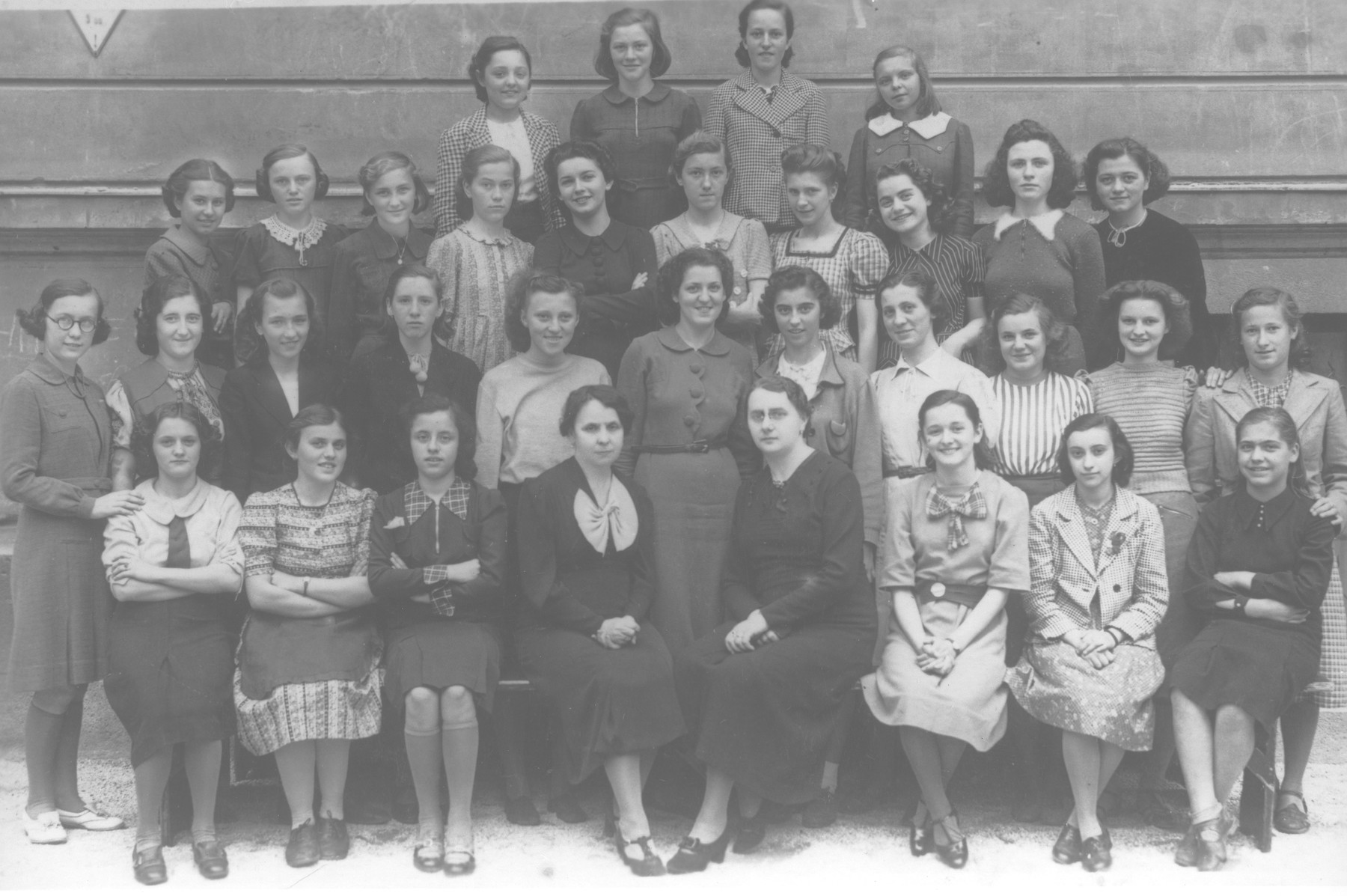 Class portrait of female students at a school in Zagreb attended by both Jews and non-Jews.

Among those pictured is Florica Kabilio (second row from the top at the far right).