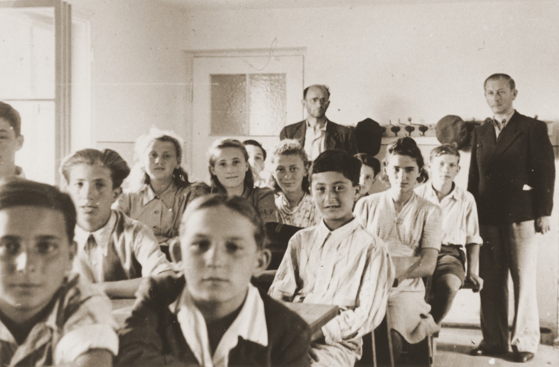 Pupils study in a classroom in the Neu Freimann DP camp.