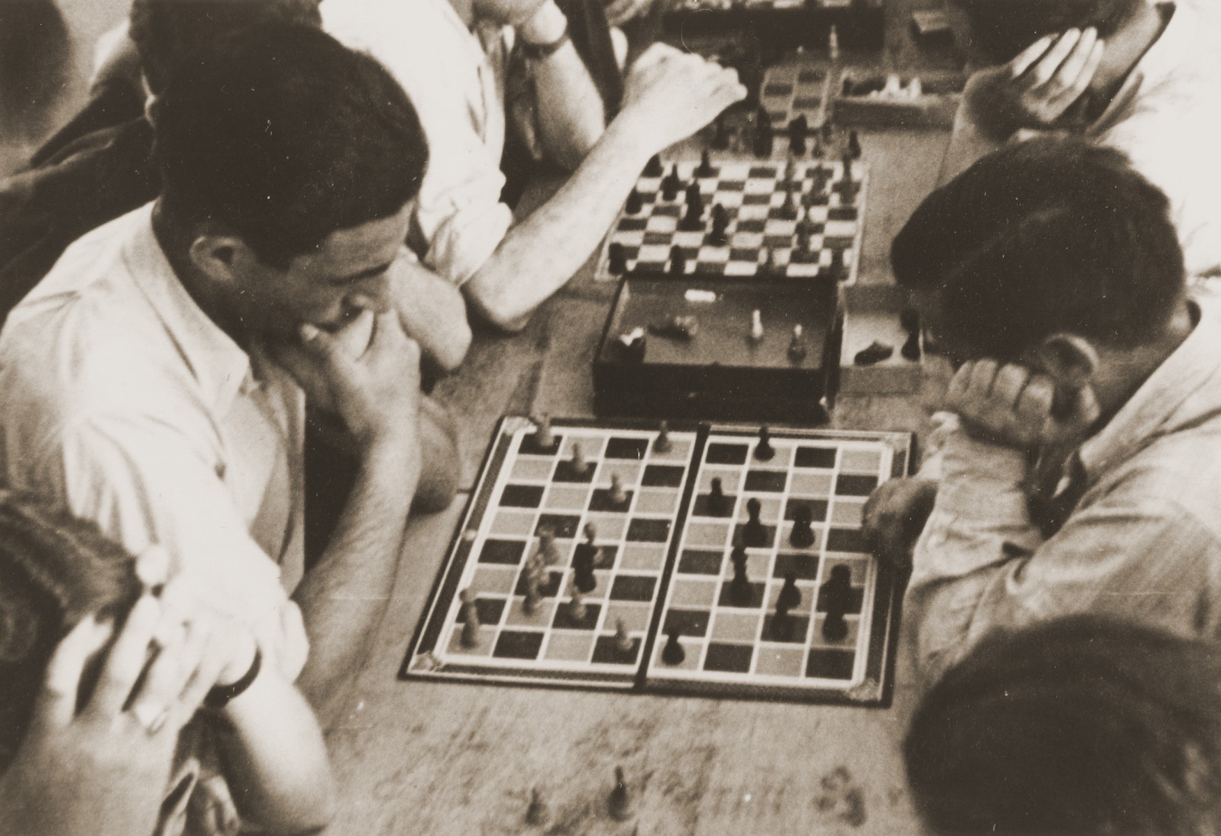 Jewish DPs from the Neu Freimann and Bergen-Belsen displaced persons camps compete with one another in an outdoor chess match.