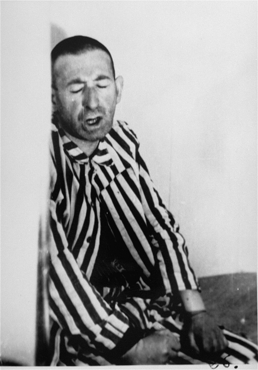 A prisoner in a special chamber responds to changing air pressure during high-altitude experiments.  For the benefit of the Luftwaffe, conditions simulating those found at 15,000 meters in altitude were created in an effort to determine if German pilots could fly and survive at that height.