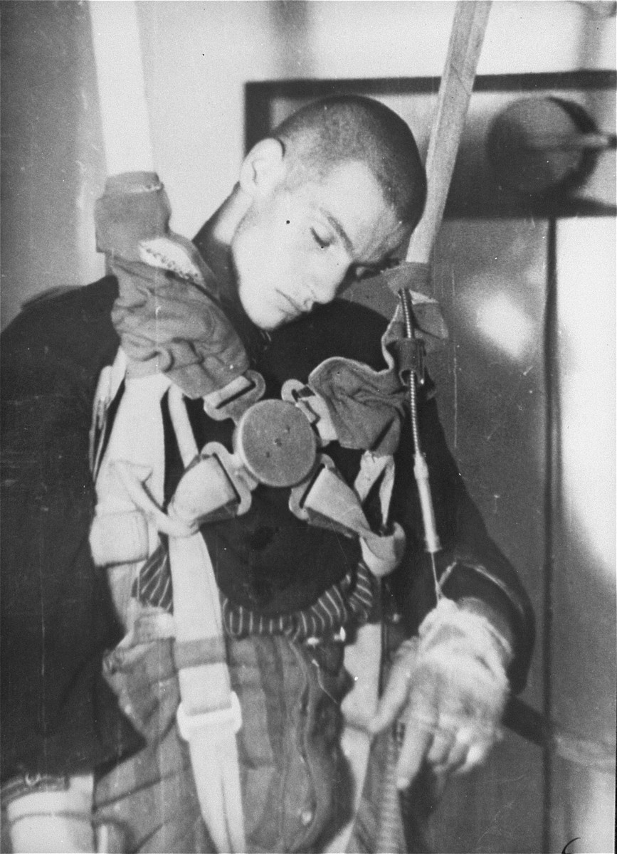 A prisoner who has been subjected to low pressure experimentation.  For the benefit of the Luftwaffe, air pressures were created comparable to those found at 15,000 meters in altitude, in an effort to determine how high German pilots could fly and survive.