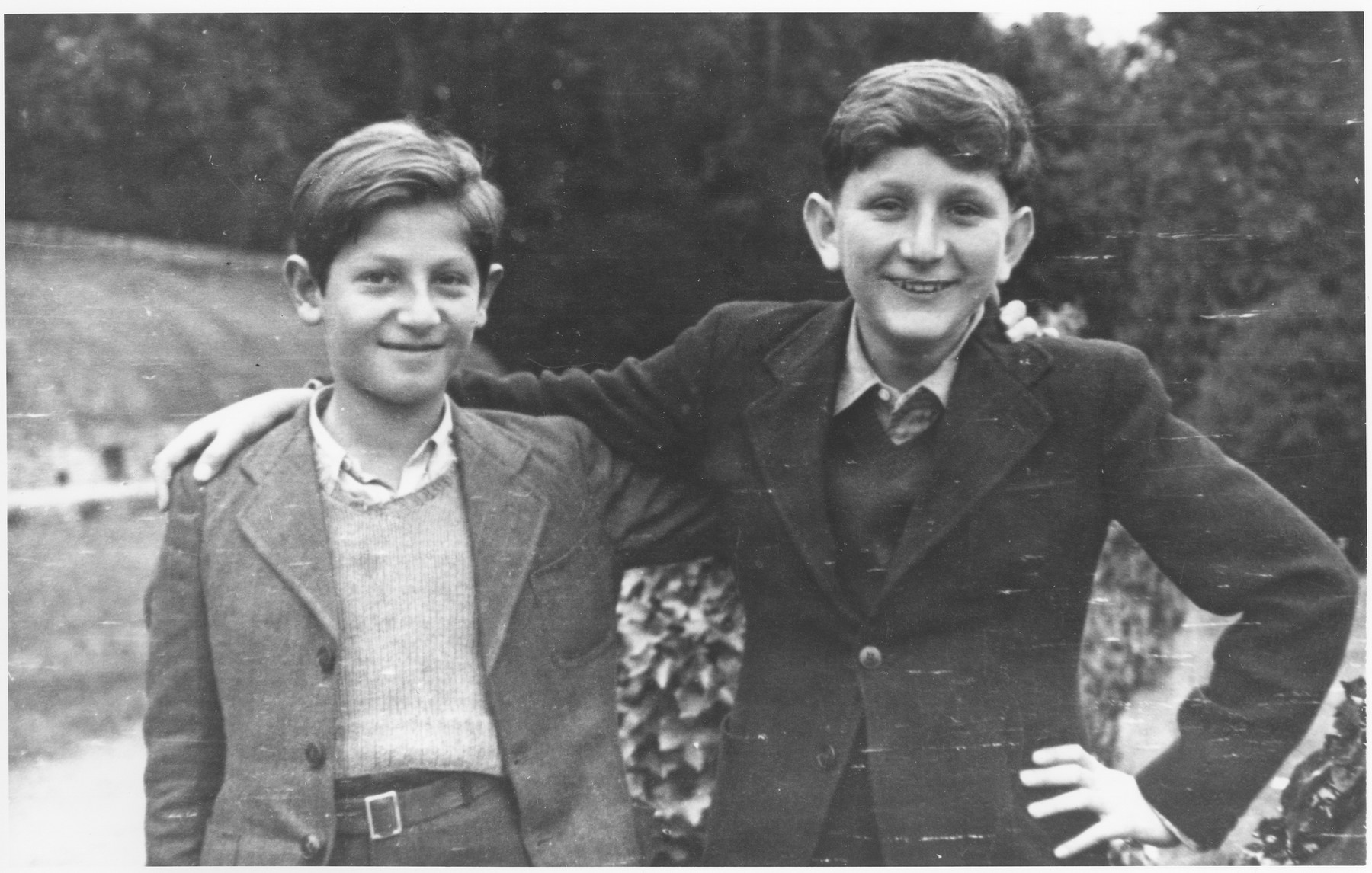 Ari Rosenberg (left) and Ivar Segalowitz (right) pose outside during the time they were residents of the Champigny children's home.