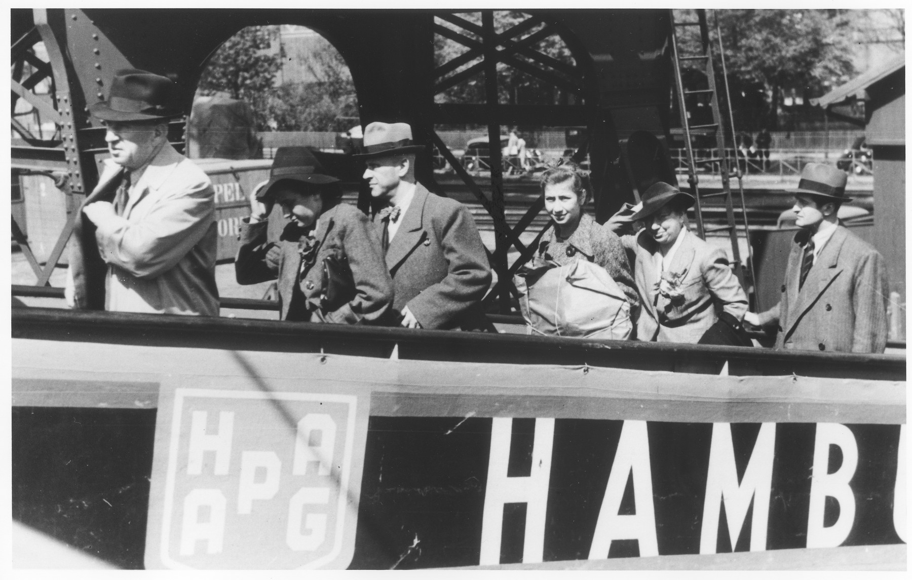 The Hess and Heilbrun families board the MS St. Louis in the port of Hamburg.

Pictured from left to right are Mr. Hess, Vera Hess, Bruno Heilbrun, Ruth Heilbrun and Selly Grete Heilbrun.