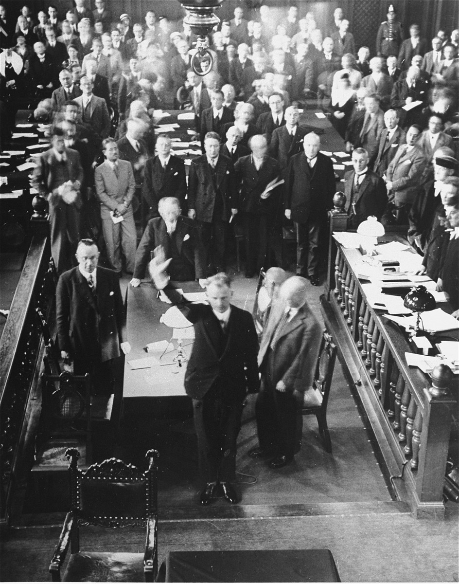 Swearing in of the Dutch defense attorney, Stomps, on the second day of the Reichstag Fire trial.  

Stomps applied for the defense of the main accused, Marinus van der Lubbe, but the defendant refused his services, stating he would defend himself alone.