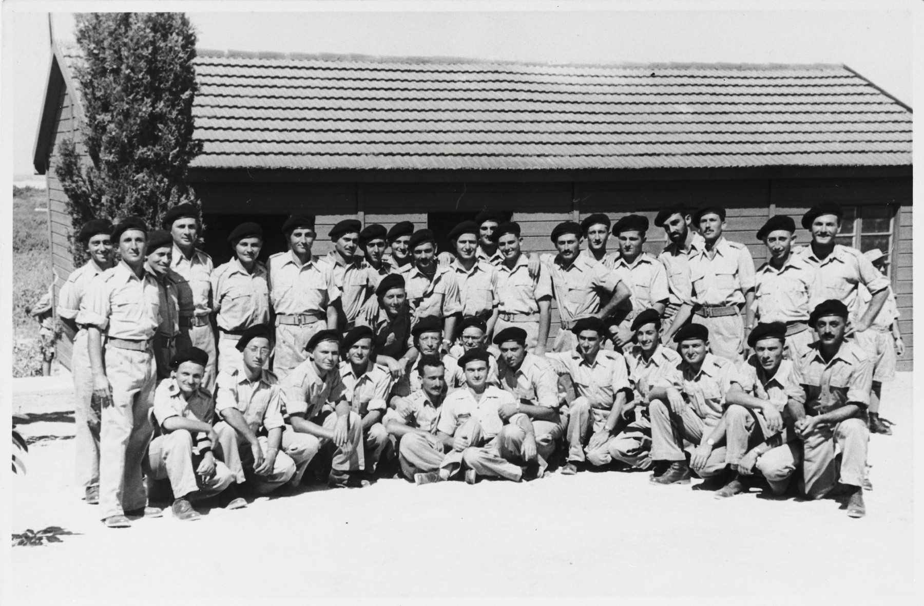 Group portrait of soldiers in a field artillery officers course.

Among those pictured is Shmuel Shalkovsky.