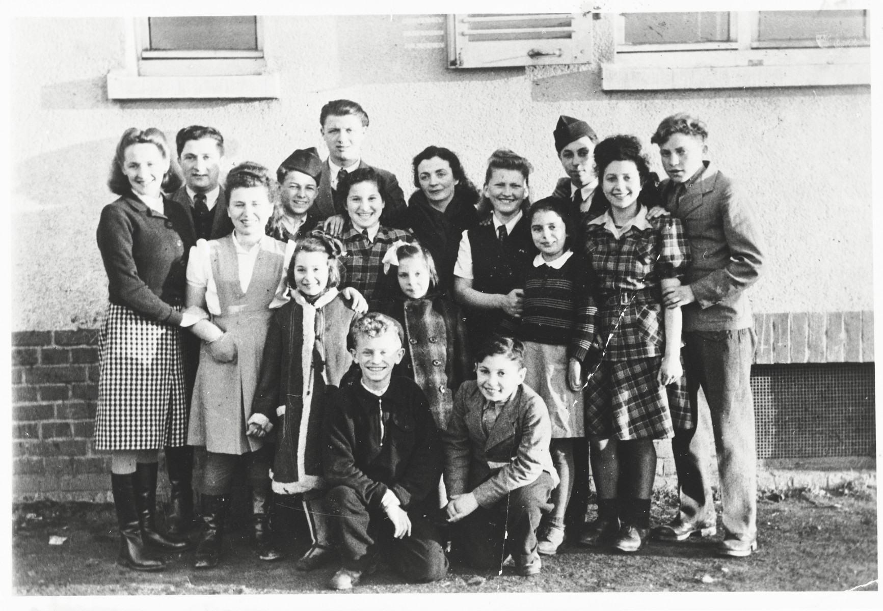 Group portrait of children in the Zeilsheim children's center.

Szlomo Waks is pictured kneeling in the front row, left.