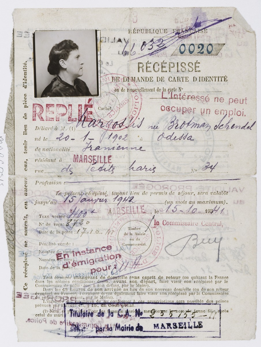 Identification card for Schendel Margosis issued by the Marseilles police stating that she is a Persian citizen and not permitted to work.  The card was stamped by the police at regular intervals.