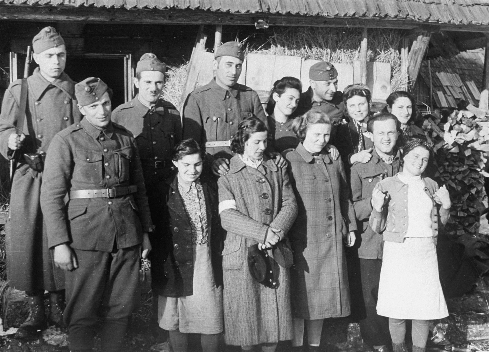 Local Jewish women wearing armbands pose with Dr. Adalbert Feher near the Hungarian-Jewish Labor Camp where Company 108/57 was housed.