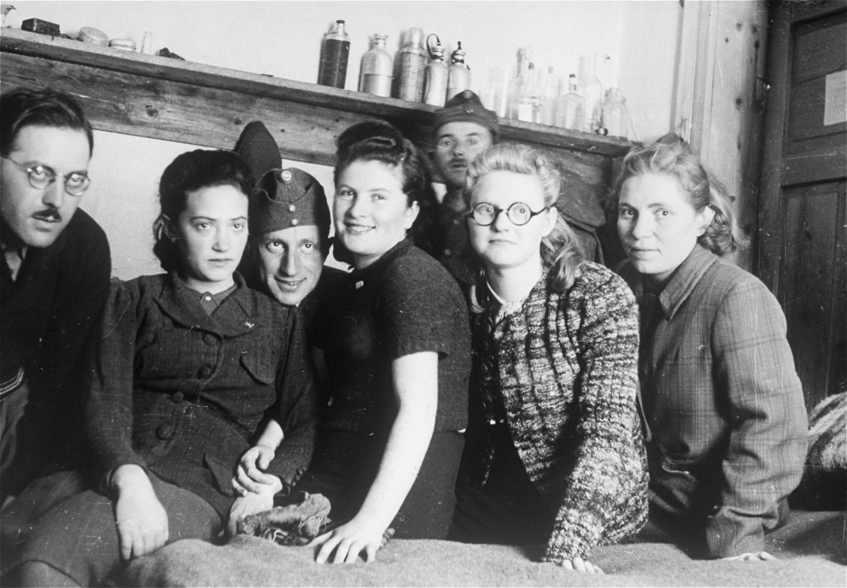 Local Jewish women pose for a photo with Dr. Adalbert Feher (L) and other Jewish conscripts in Company 108/57 of the Hungarian Labor Service.