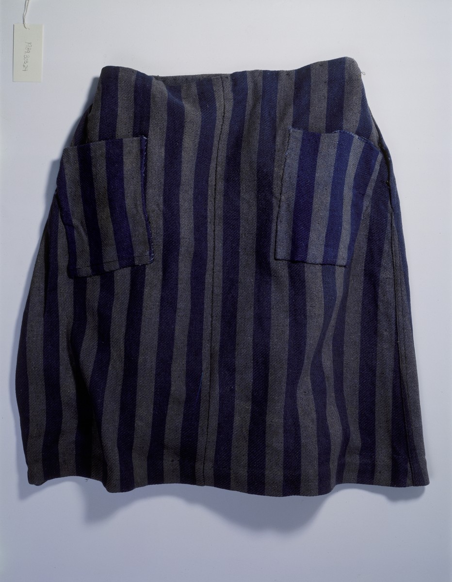 The striped skirt of a prison uniform worn at the Auschwitz concentration camp.