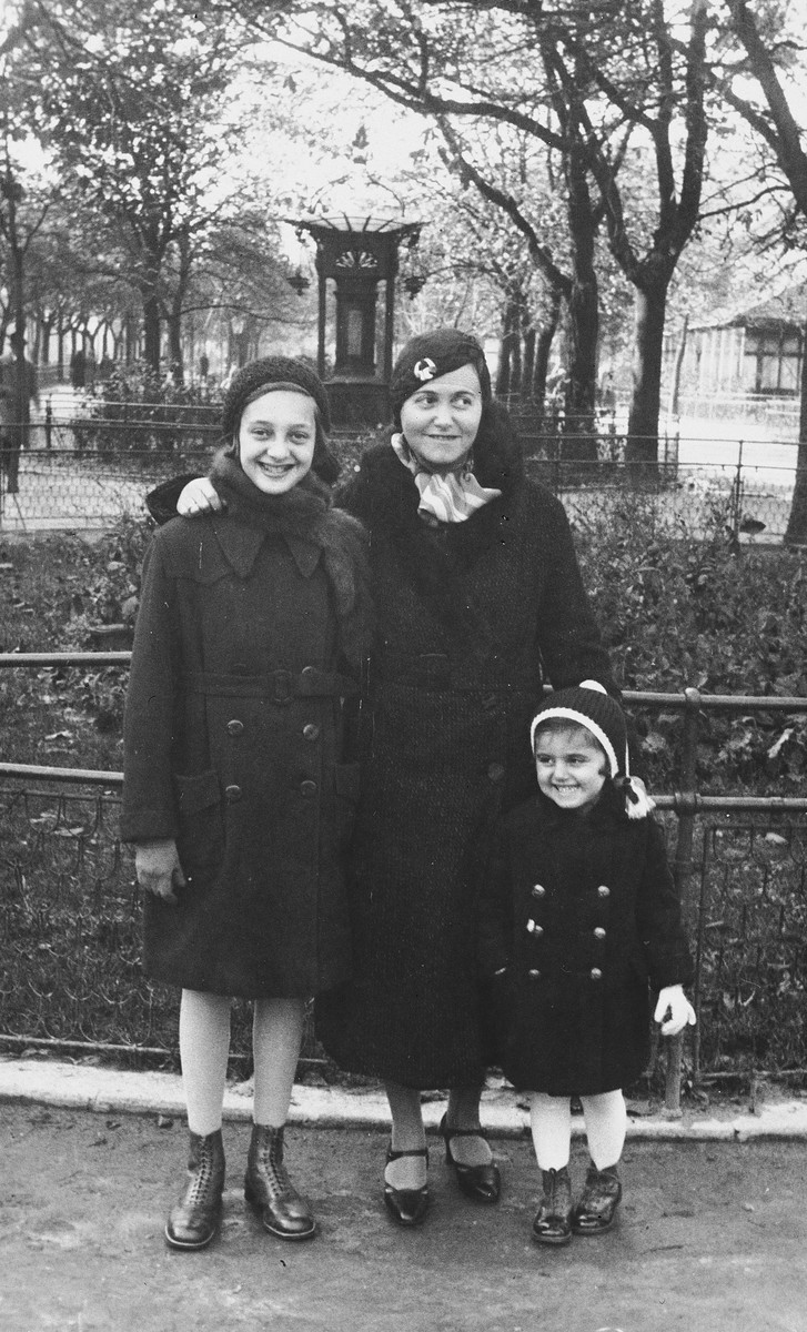 Kitty Weichherz poses with her mother and her older cousin, Klari Neumann, in a park [probably in Bratislava].

This photo was taken from the diary of Kitty's life written by her father, Bela Weichherz.