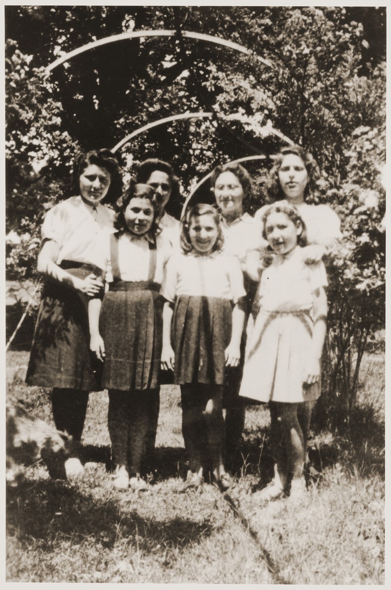 Group portrait of Jewish refugee children, who had been released from French internment camps, at the OSE [Oeuvre de secours aux enfants] home for religious girls at Le Couret.

Pictured are Lison Kleeman, Bertha, Marion, Lucie, Helene Klizman, Esther, Sophie, and Vicki Kahn.