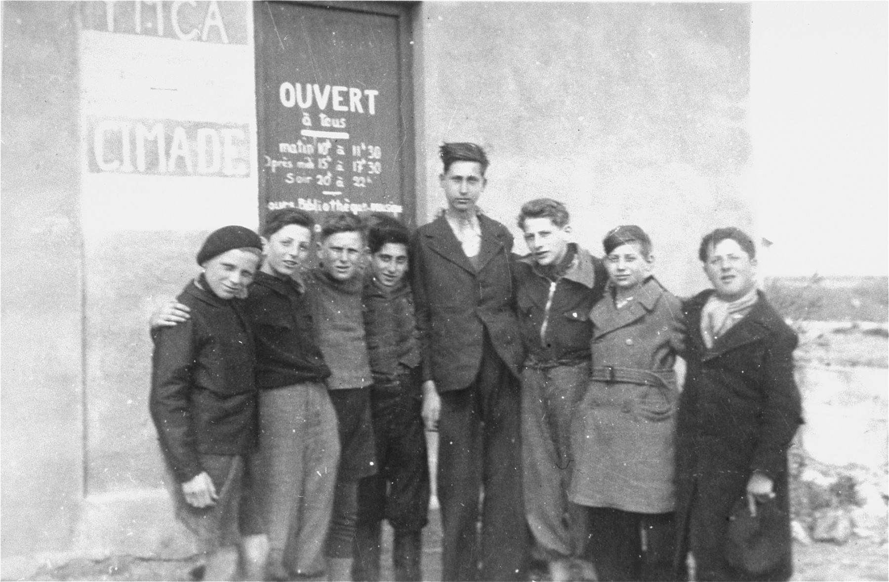 Members of a boy scout troop organized by Simone Weil in the Rivesaltes transit camp.

Second from right is Werner Heilbronner (now Daniel Barnea).  Fourth from right is his brother Kurt (now Uri) Heilbronner.