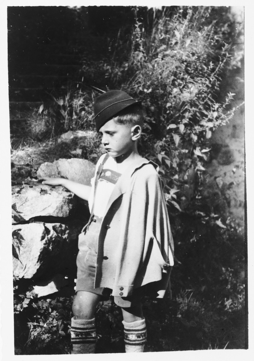 Fritz Glueckstein, a young German Jewish boy, poses in traditional German costume.