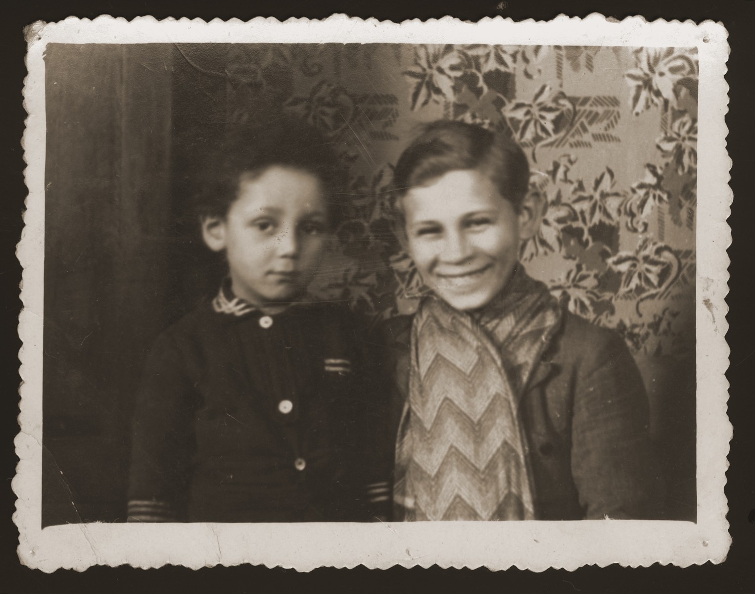Portrait of two young Jewish boys in Chelm.

Pictured are Mojszale Nissenbaum (left) and ? Schumacher, cousins of Estera Ajzen, who were later killed in Chelmno.