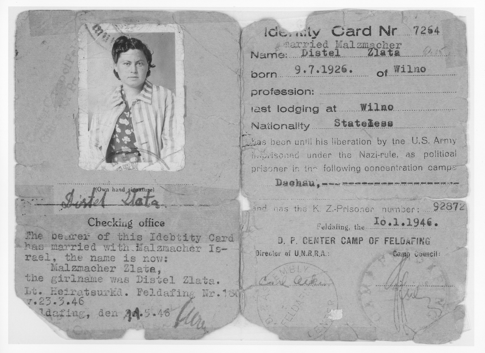 DP camp identification card issued to Zlata Distel at the Feldafing displaced persons camp.  

In her ID photo the young woman is wearing the jacket of her concentration camp uniform.