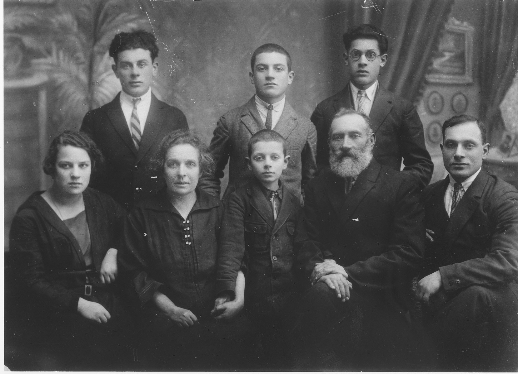 Portrait of the Szclubsky family in Lida, Poland.

Pictured seated from right to left are Jacob, Aaron Zev, Chaim, Zipora Feigl and Bela.  Standing behind them are Zvi, Moshe and Joshua Szclubsky.