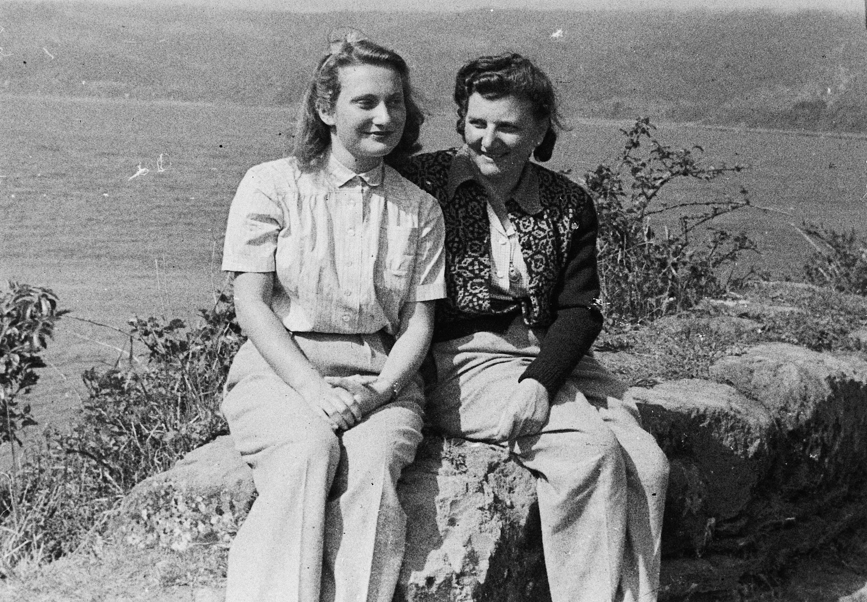 A mother and daughter, recent immigrants to Chile and survivors of Nazi concentration camps, pose outdoors together.

Pictured are Katerina Margolius and Ines Margolius Renner.