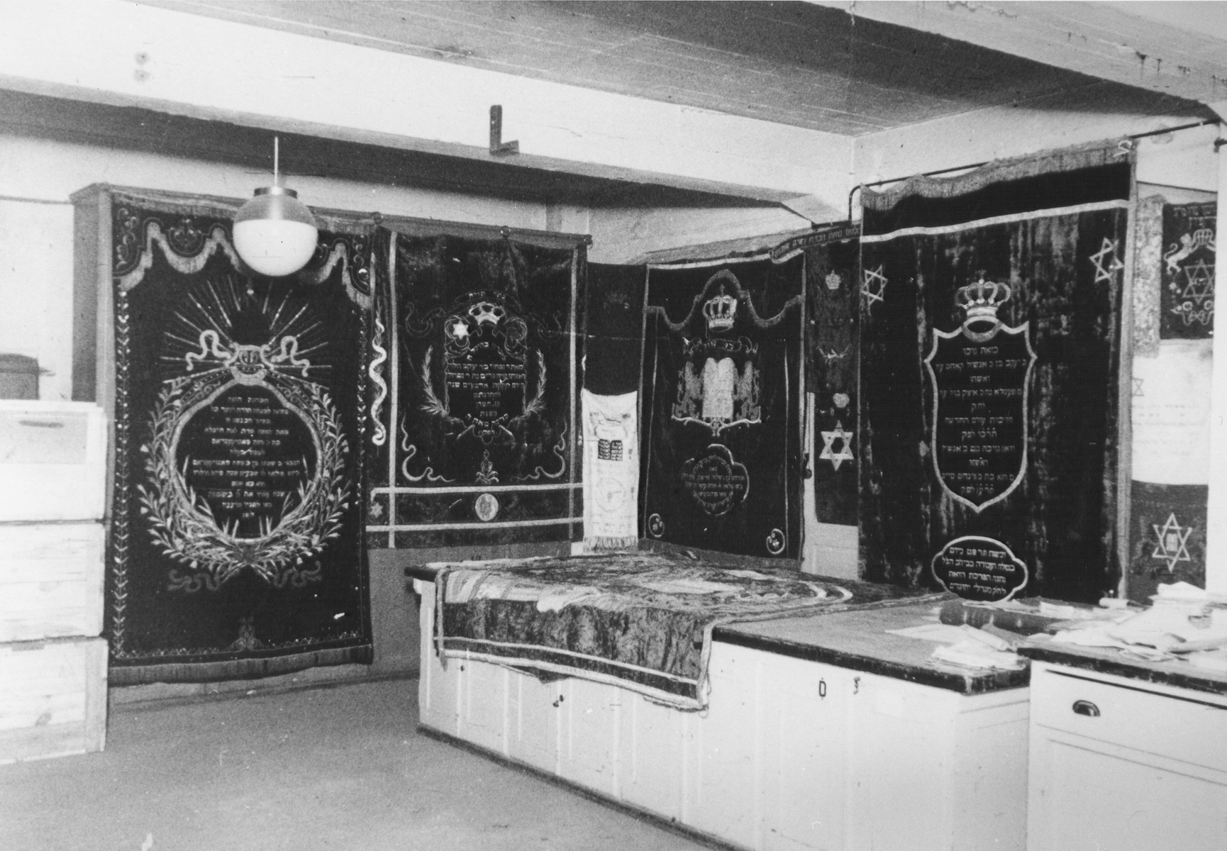 Display of ritual synagogue textiles confiscated by the Nazis.