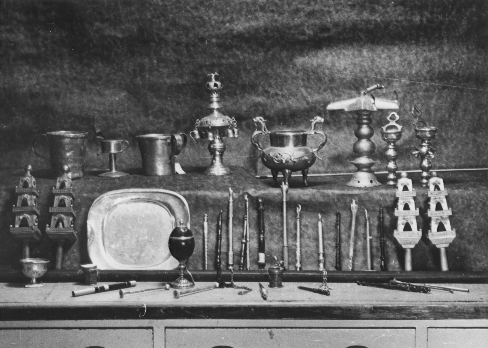 Display of confiscated silver torah crowns, torah pointers and other ritual objects looted from European synagogues.
