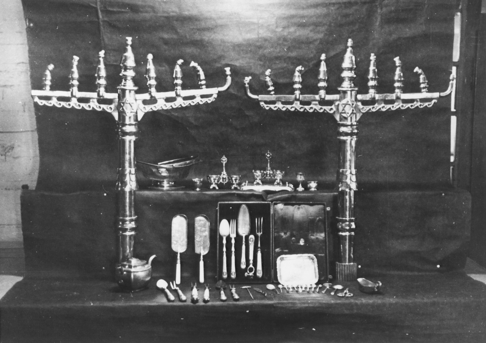 Display of confiscated menorahs and other ritual objects looted from European synagogues.