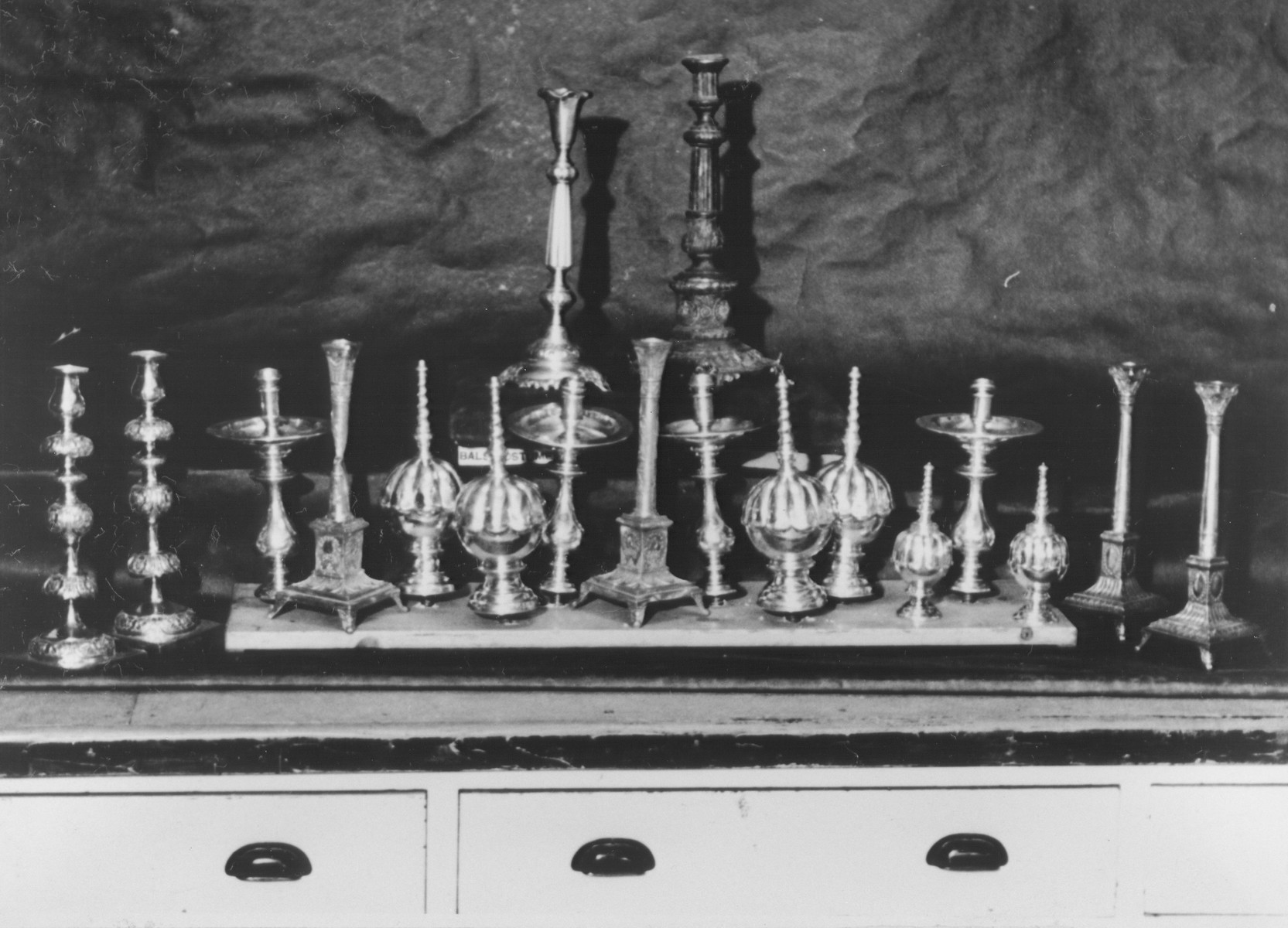 Display of confiscated silver Sabbath candlesticks.
