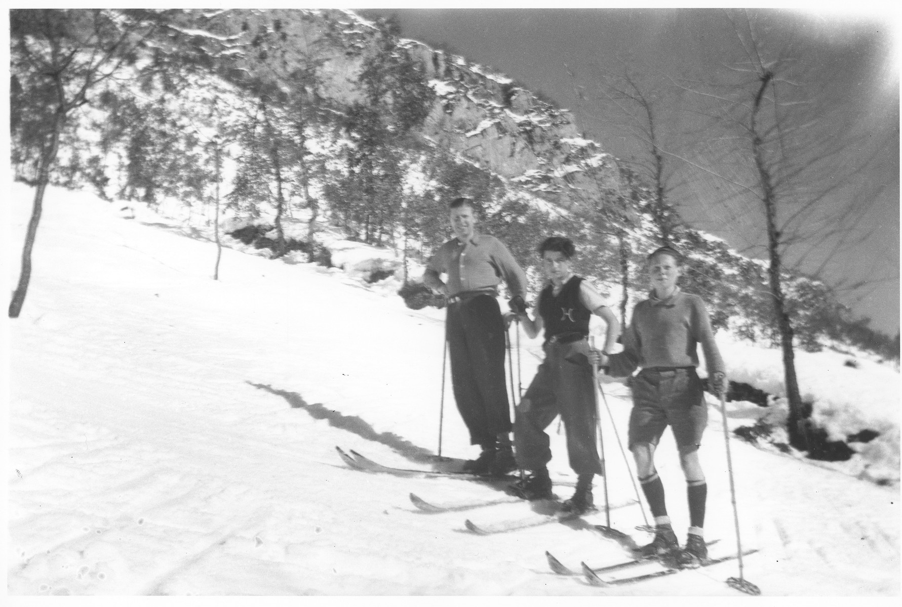 Jewish refugees ski near Valle Stura, Italy after escaping over the border from France.

Those pictured include Karl Tepper, Leopold Neuman, and Carl Roman.