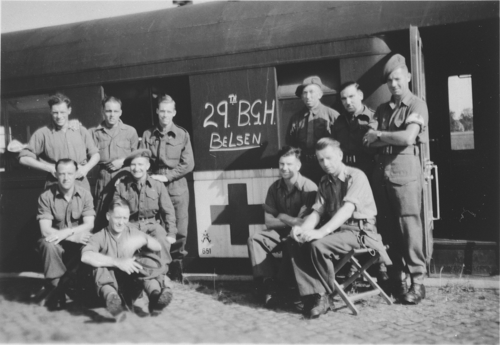 Group portrait of the staff of the ambulance train that took survivors from Bergen-Belsen to Sweden for recuperation.