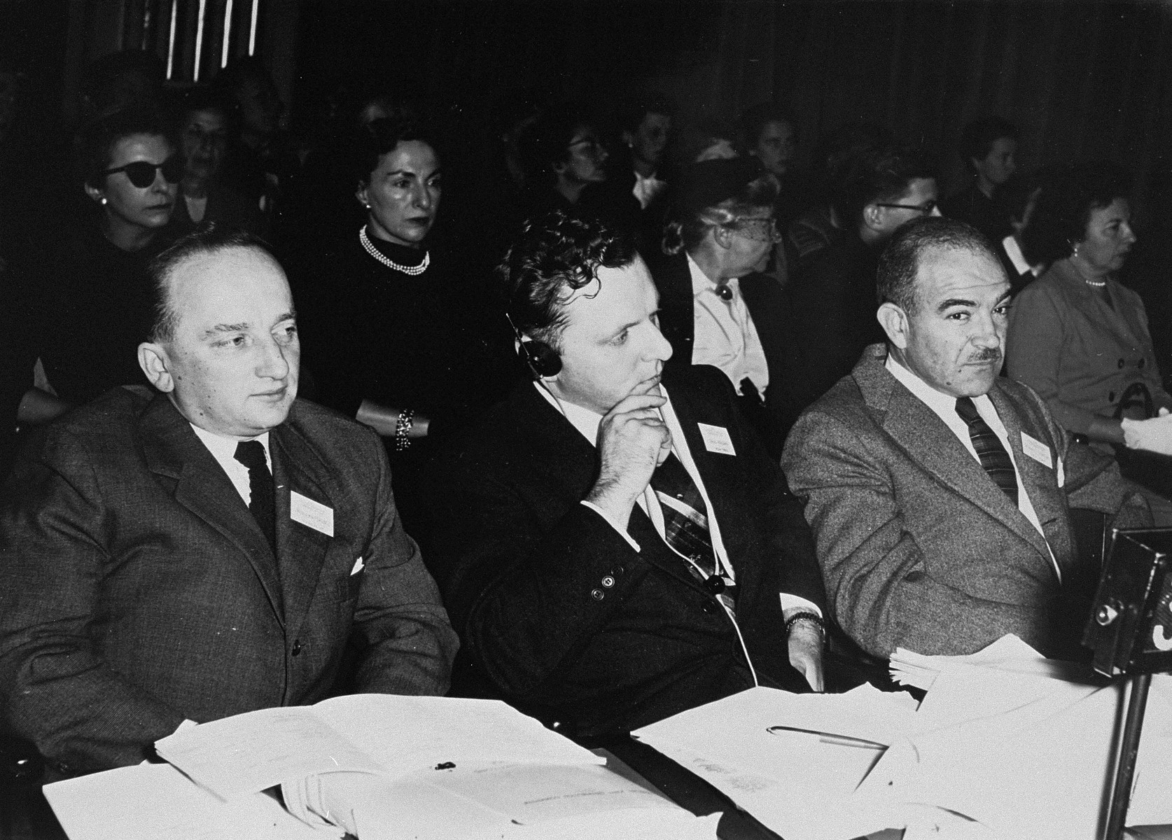 Three Jewish leaders participate in the tenth annual Country Directors Conference of the American Jewish Joint Distribution Committee at UNESCO House.  

Pictured from left to right are: Benjamin Ferencz, Director-general of the Jewish Restitution Successor Organization; Saul Kagan, Secretary of the Conference on Jewish Material Claims; and Dr. Judah J. Shapiro, Cultural Director of the Conference on Jewish Material Claims.